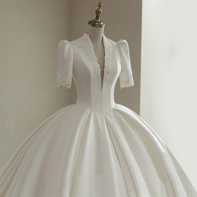 Nine Seven Appliques Plunging V-Neck Half Sleeves Ball Grown Satin Court Wedding Dress